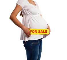 stock-photo-24186397-pregnant-woman-holding-sign-for-sale